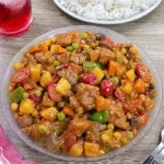 Beef noodle stir fry with colorful vegetables and tender meat ready to serve