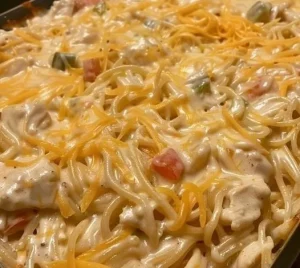 Cheesy Chicken Spaghetti Casserole in a baking dish