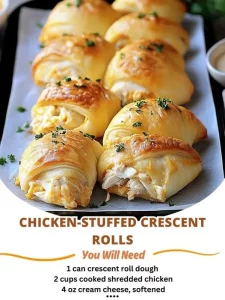 Chicken stuffed crescent rolls fresh out of the oven, golden and flaky.