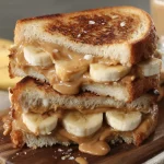 Grilled peanut butter banana sandwich toasted to perfection.