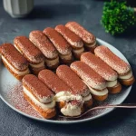 Classic tiramisu dessert with layers of espresso-soaked ladyfingers and mascarpone cream